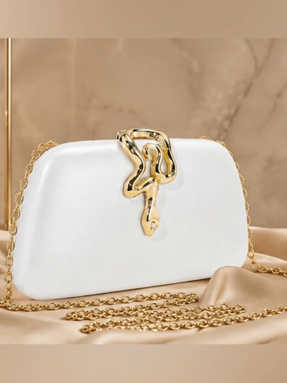 Elegant White Clutch with Gold Snake Accent